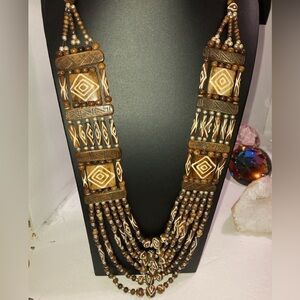 Vintage wood & bone necklace.  Tribal design.